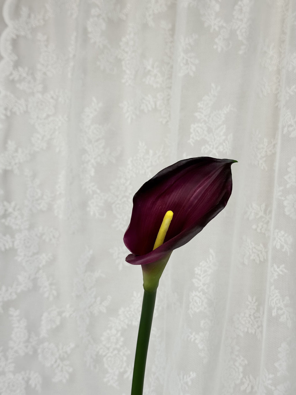 Large artificial Bordeaux calla lily by Fleuristic, showcasing detailed petals and realistic floral design.