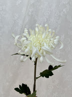 Large white artificial chrysanthemum flower by Fleuristic with detailed petals and realistic appearance.