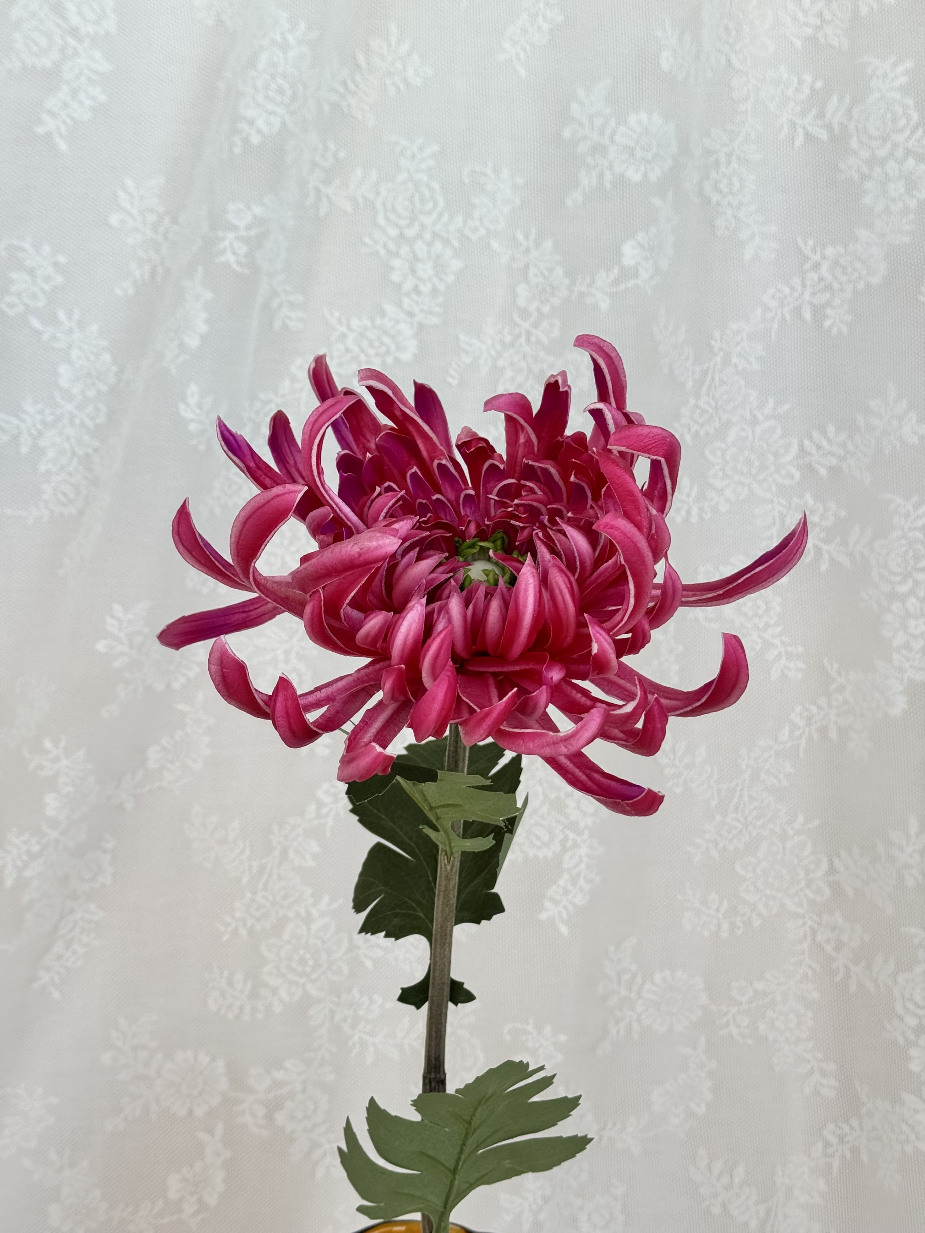 Large pink artificial chrysanthemum flower by Fleuristic, detailed close-up of vibrant, realistic faux flower for home decor.