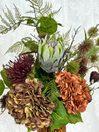 Fleuristic Autumn Muse artificial flower bouquet with warm autumn-toned leaves and blooms, perfect for seasonal home decor.