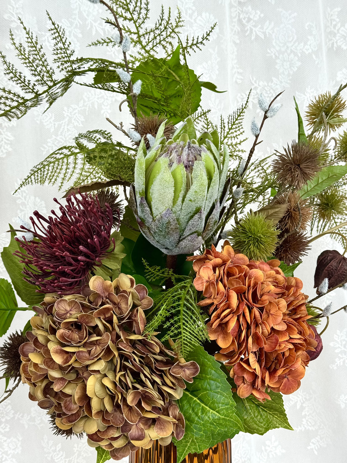 Fleuristic Autumn Muse artificial flower bouquet with warm autumn-toned leaves and blooms, perfect for seasonal home decor.