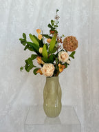 Artificial floral bouquet named Sunset Dream by Fleuristic, featuring vibrant, sunset-inspired colors and lush flower arrangements.