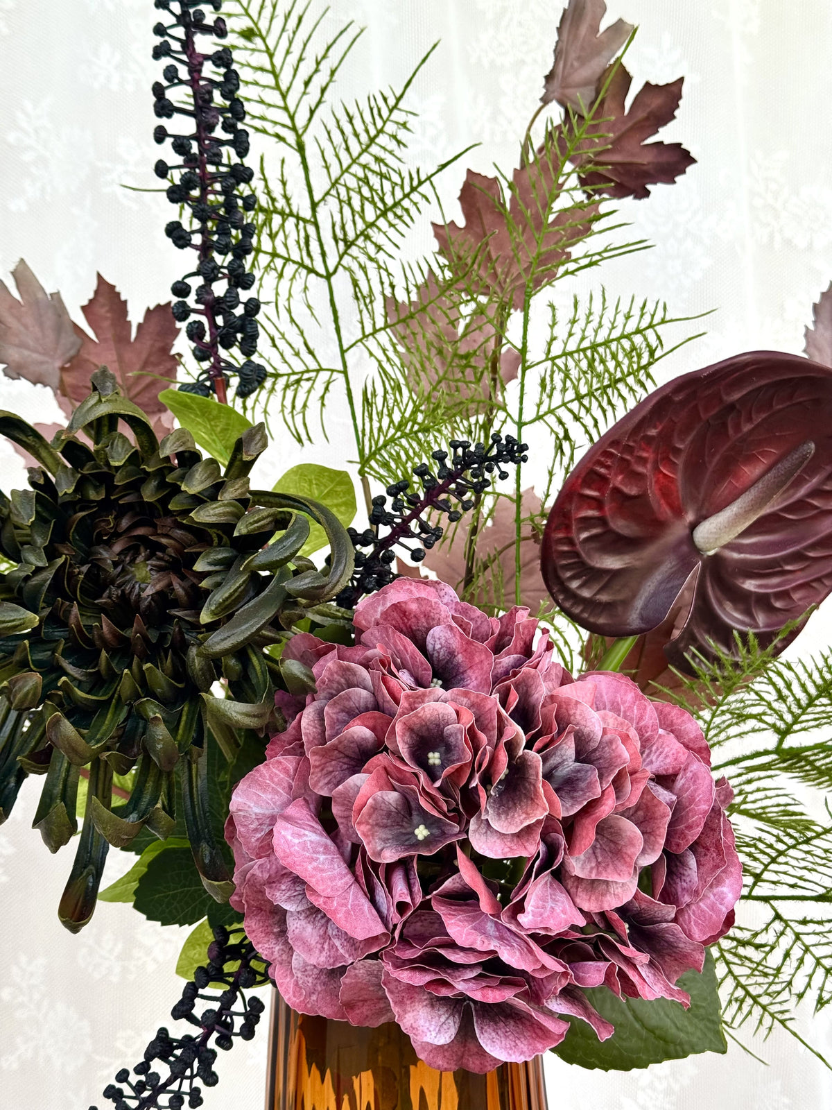 Fleuristic Velvet Cherry artificial bouquet showcasing soft velvet cherries and lush green leaves in a realistic floral arrangement.