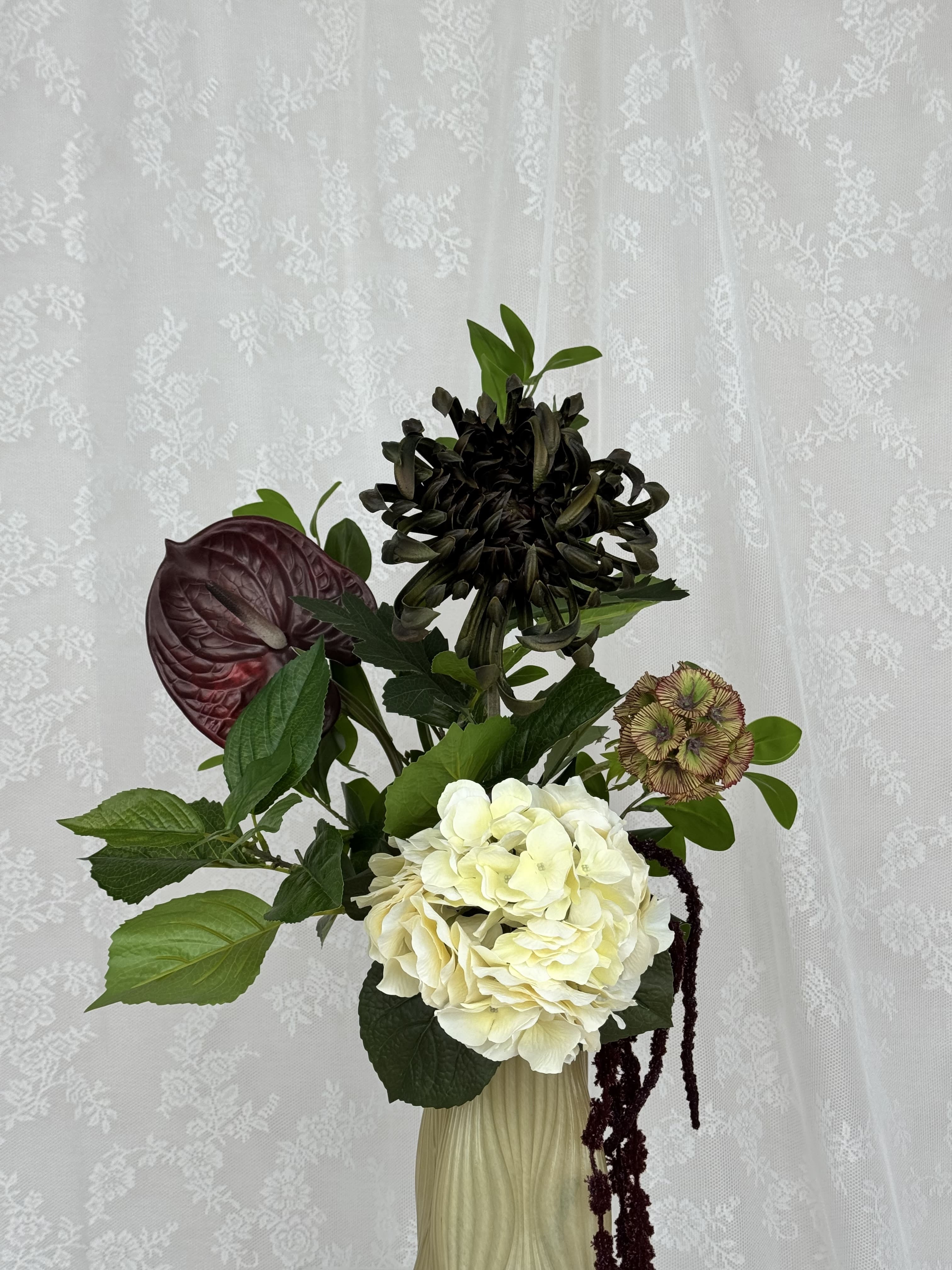 Artificial autumn forest bouquet by Fleuristic featuring vibrant fall foliage and detailed natural-looking leaves.