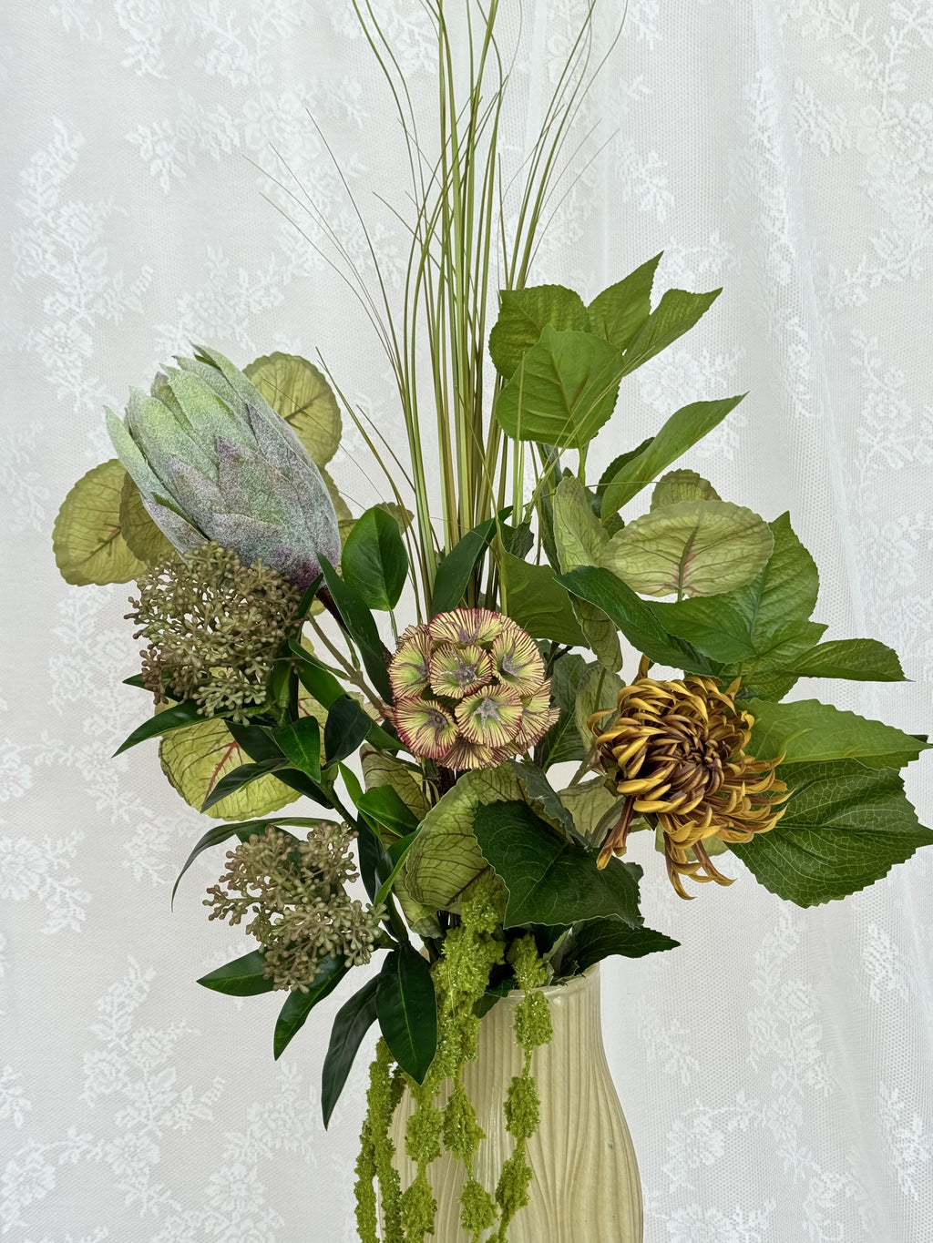 Artificial green forest bouquet by Fleuristic with lush foliage and detailed greenery for natural home decor.