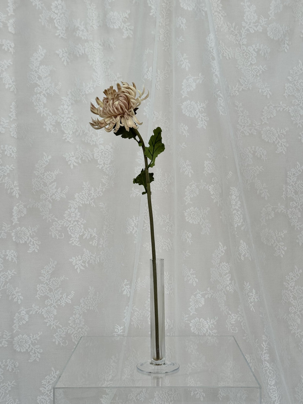 Cream-colored artificial chrysanthemum flower by Fleuristic, showcasing realistic petals and detailed craftsmanship.