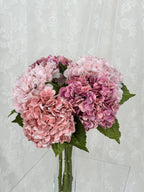 Artificial pink hydrangea flower bouquet by Fleuristic, featuring detailed, vibrant pink blossoms in a natural arrangement.