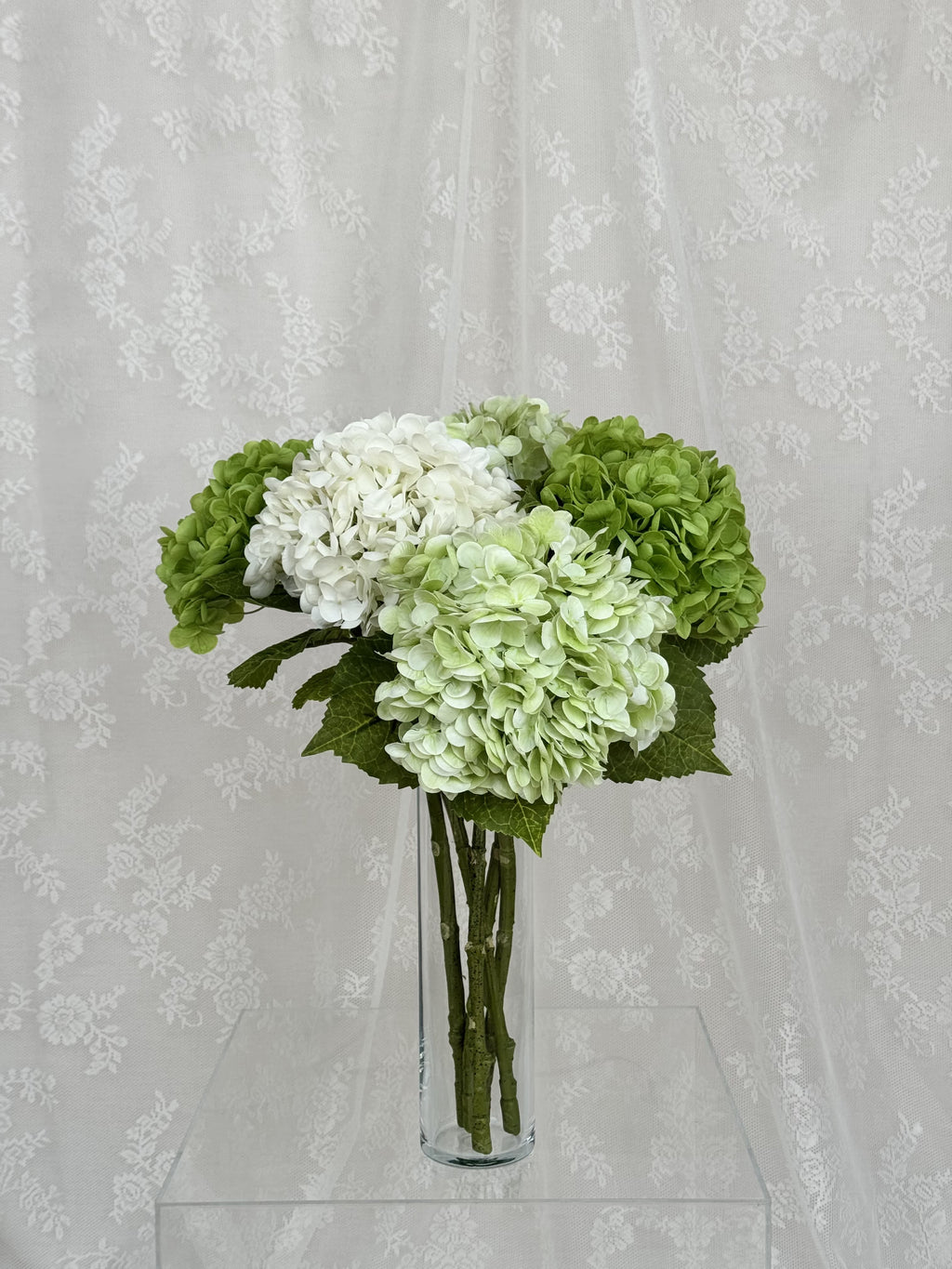 Artificial green hydrangea bouquet from Fleuristic, showcasing lush, vibrant blooms for natural floral decor.