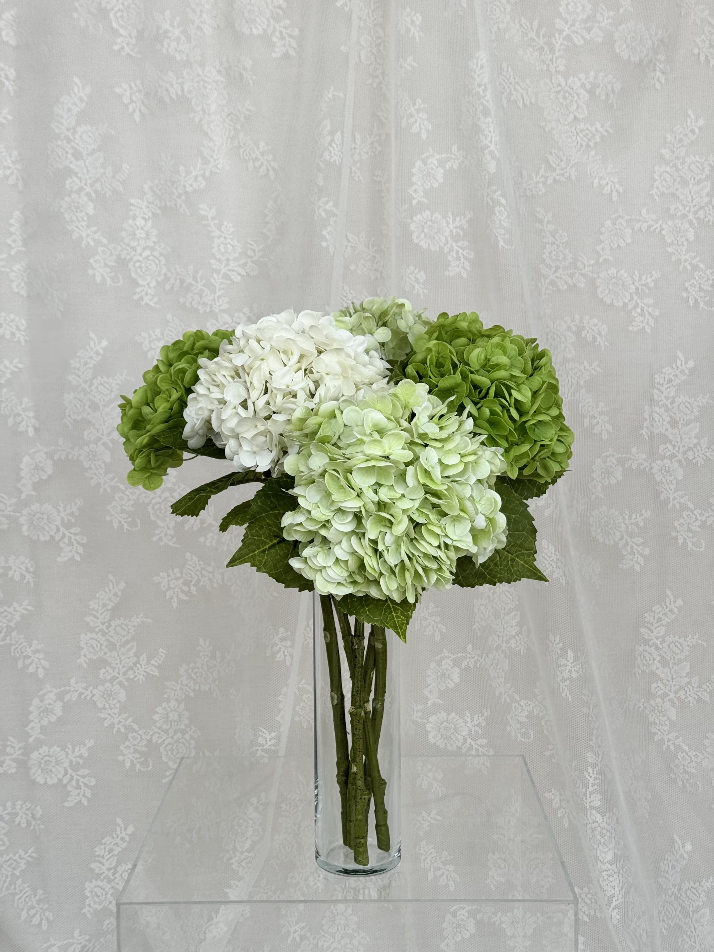 Artificial green hydrangea bouquet from Fleuristic, showcasing lush, vibrant blooms for natural floral decor.