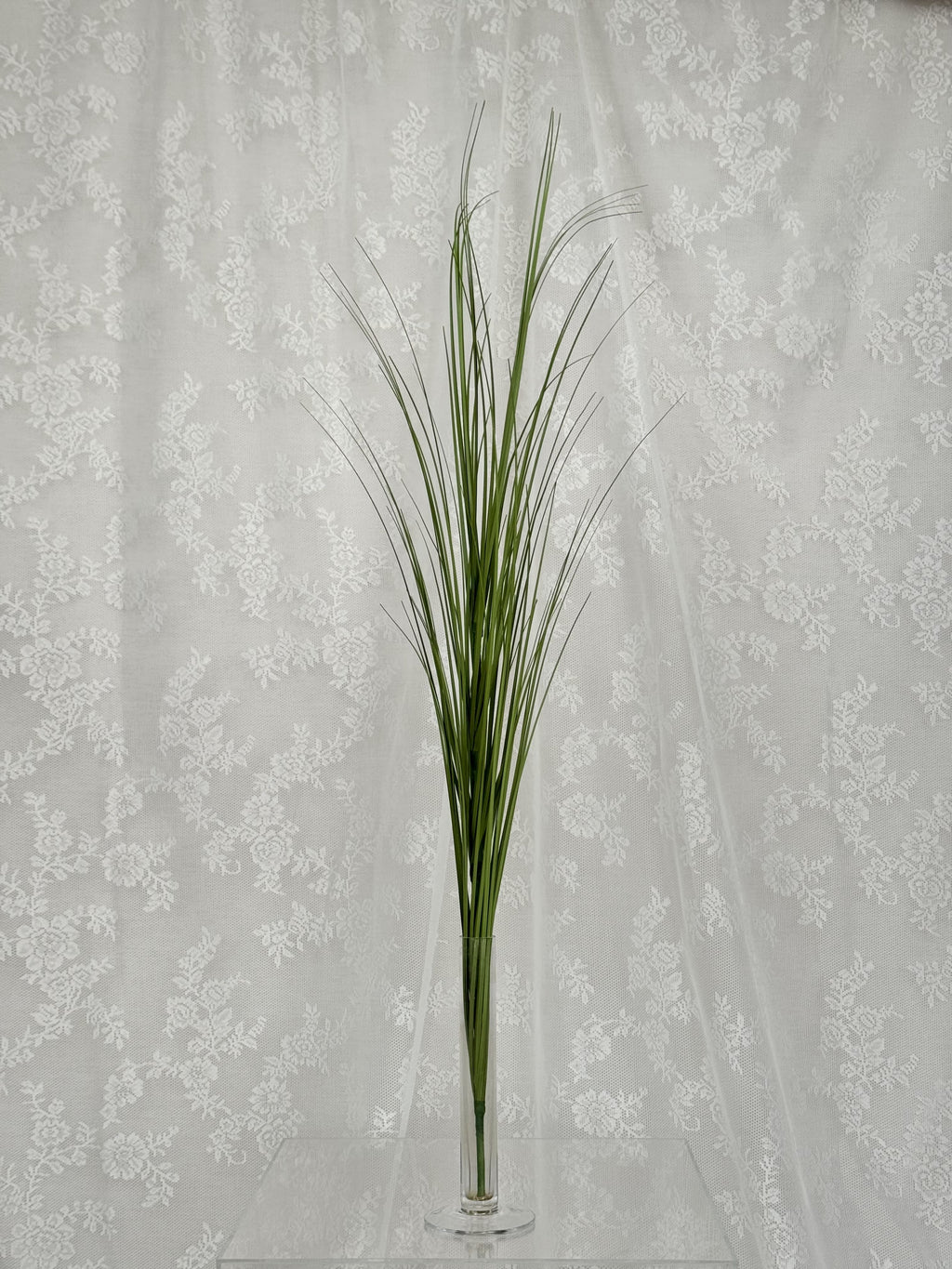 Artificial green Siv plant by Fleuristic, realistic faux grass with lush, vibrant foliage for home decor or office accents.