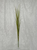 Artificial yellow Siv plant from Fleuristic, with vibrant foliage, suitable for decorative indoor or outdoor use.