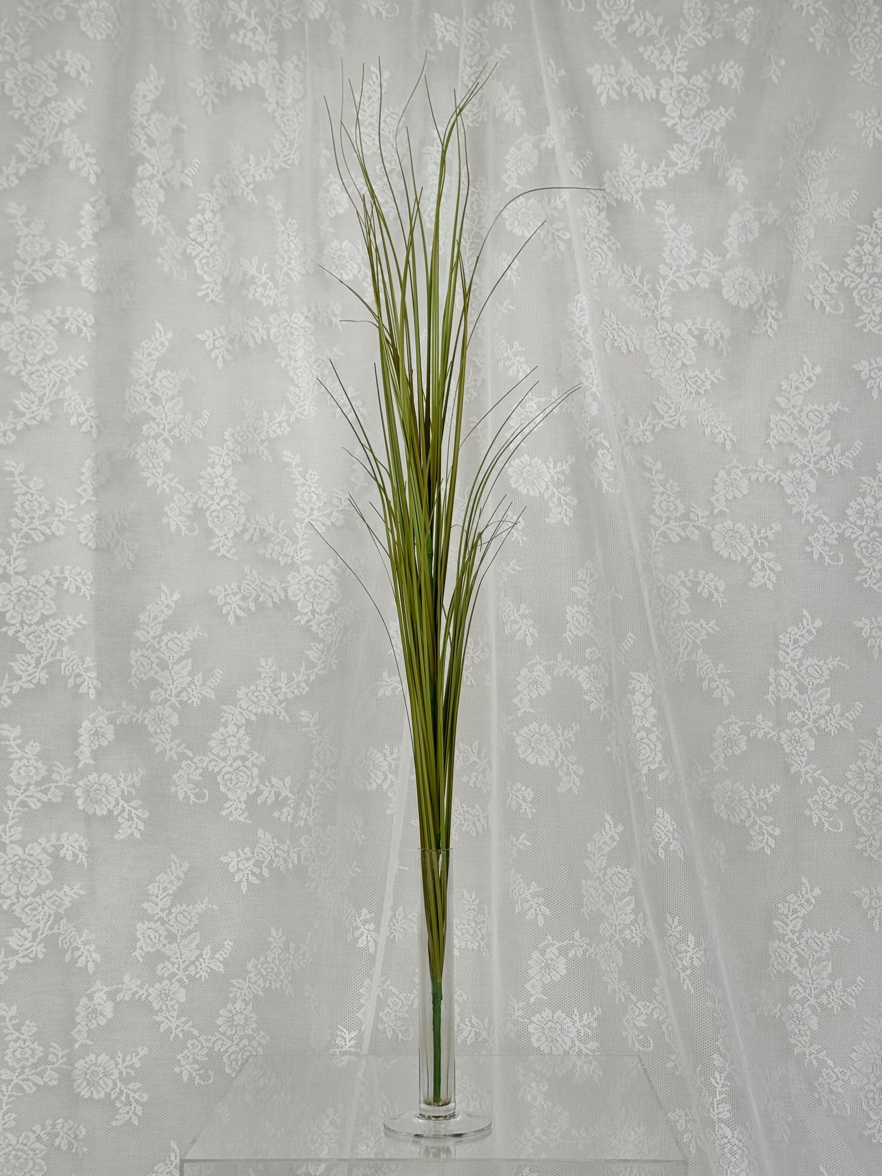 Artificial yellow Siv plant from Fleuristic, with vibrant foliage, suitable for decorative indoor or outdoor use.