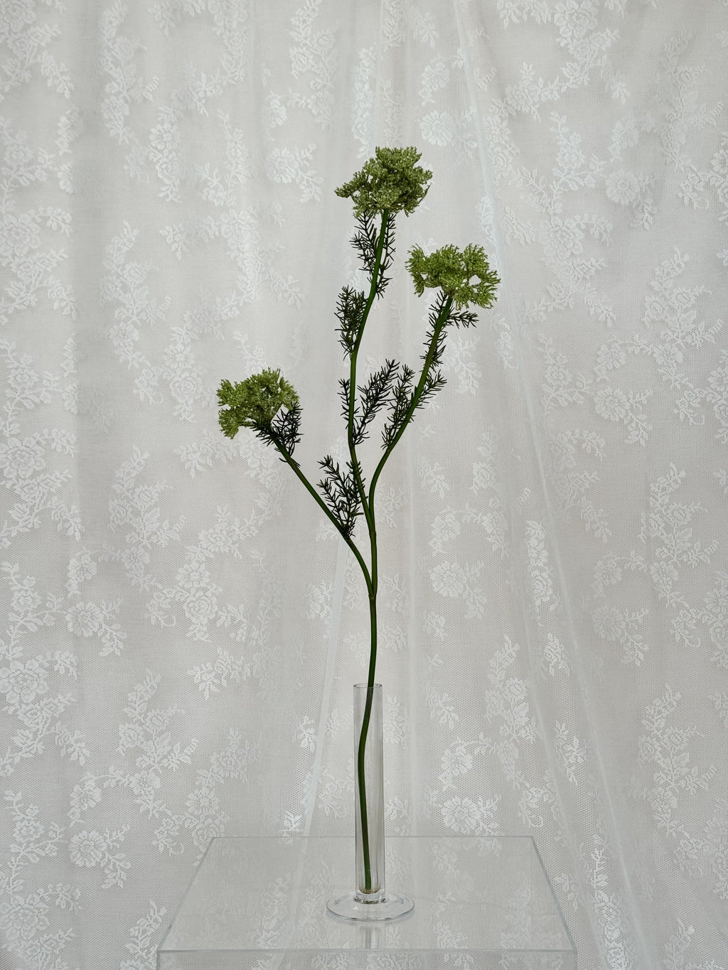 Artificial wild carrot flower by Fleuristic, showcasing realistic orange and green foliage with vibrant, natural-looking petals.