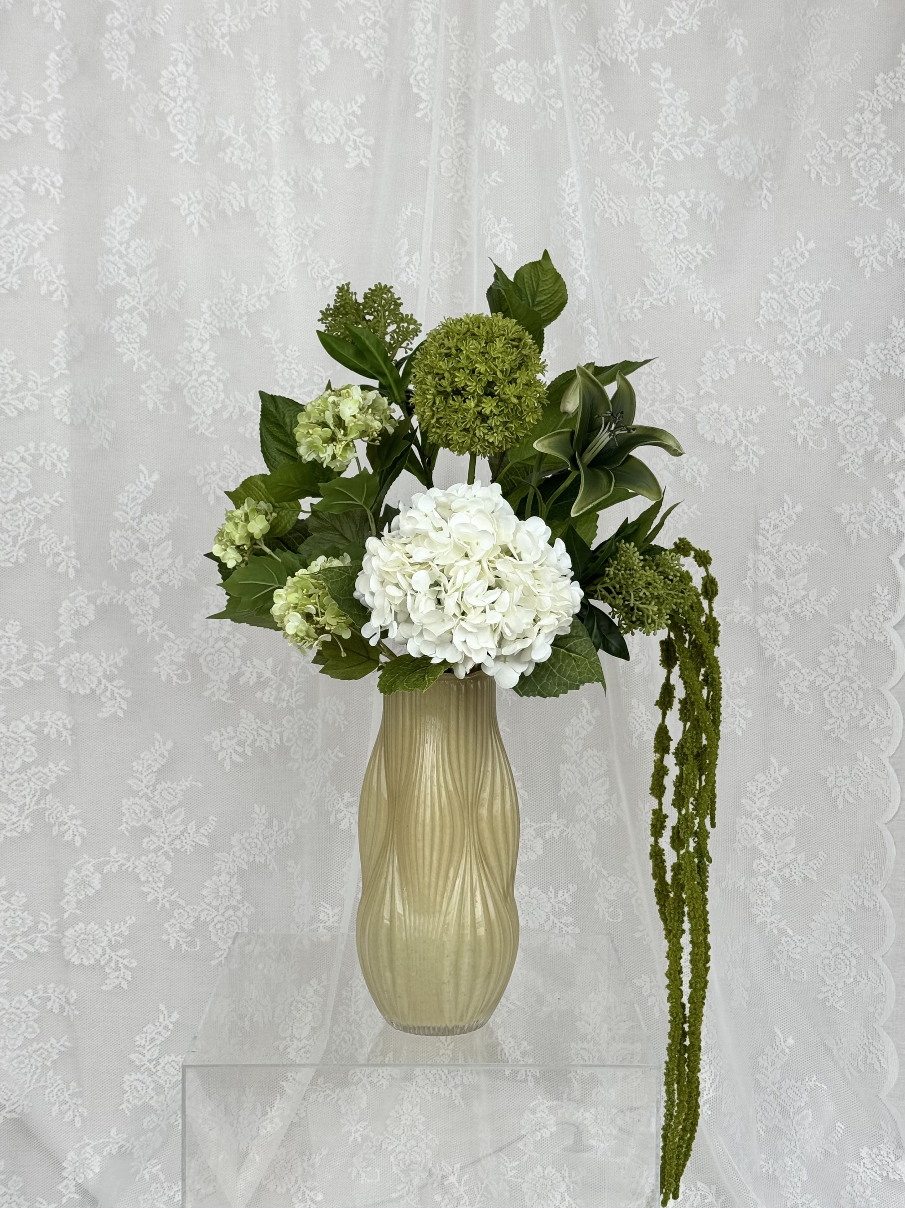 Green Classic bouquet by Fleuristic featuring lush green foliage and vibrant floral elements arranged beautifully.