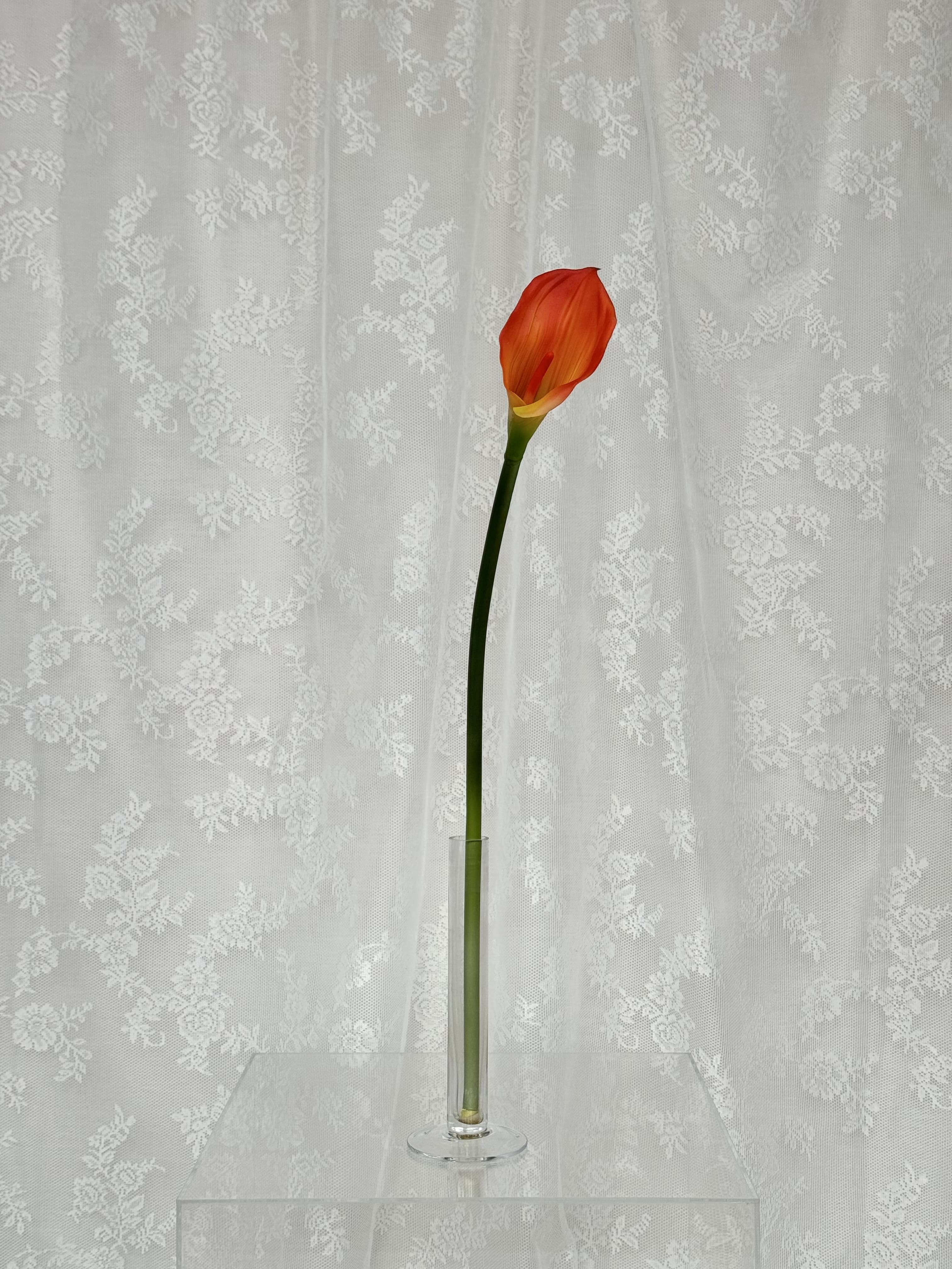 Artificial large orange calla lily by Fleuristic, showcasing vibrant petals and realistic floral details.